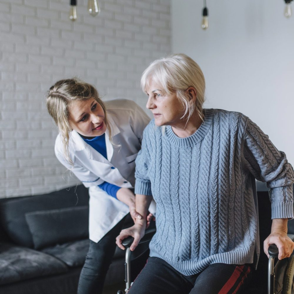 woman-with-wheelchair-old-age-home